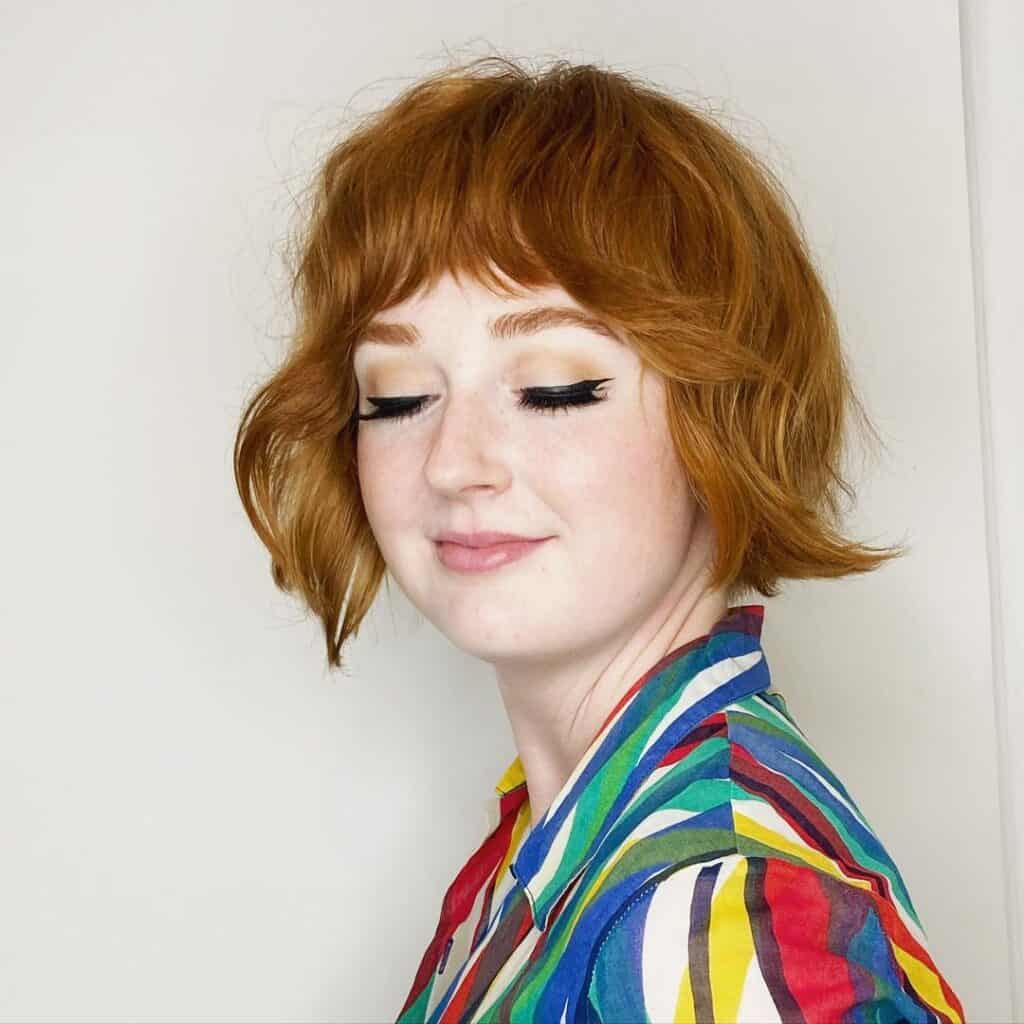 short ginger bob with a fringe