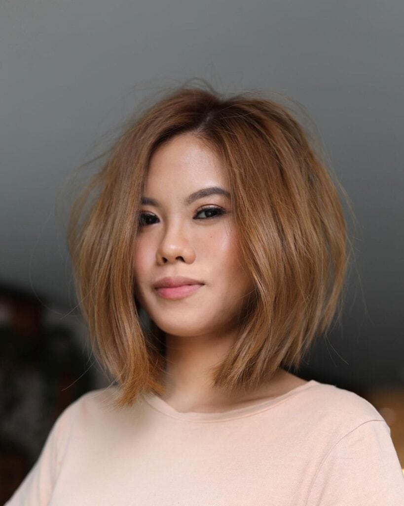 rounded bob with off center parting 