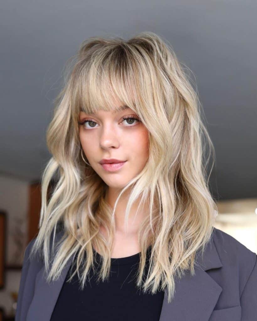 blonde cut with fringe