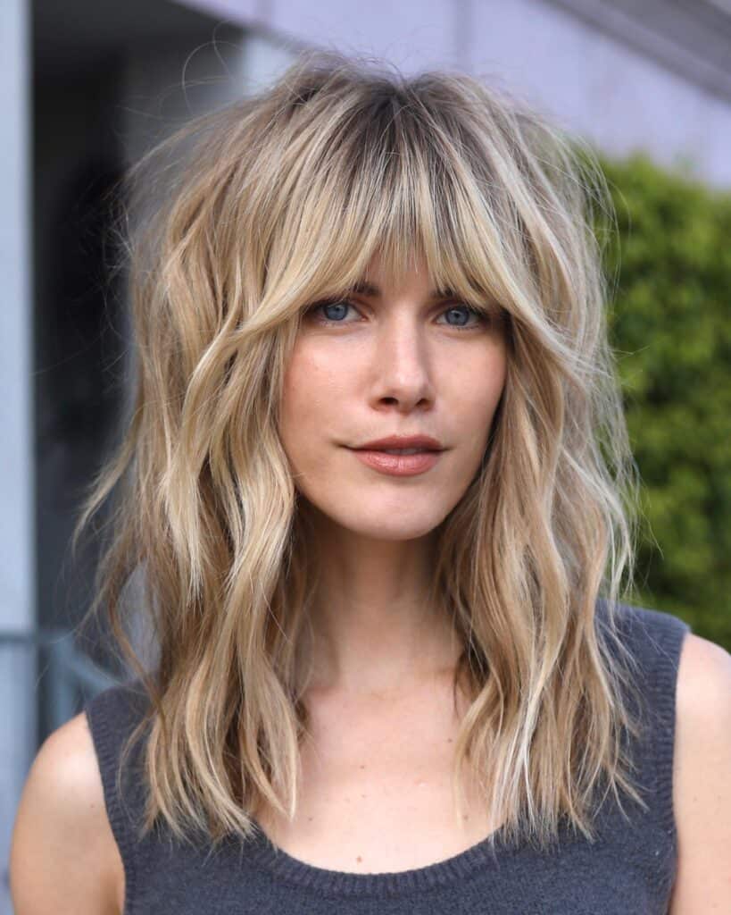 shag cut with curtain bangs