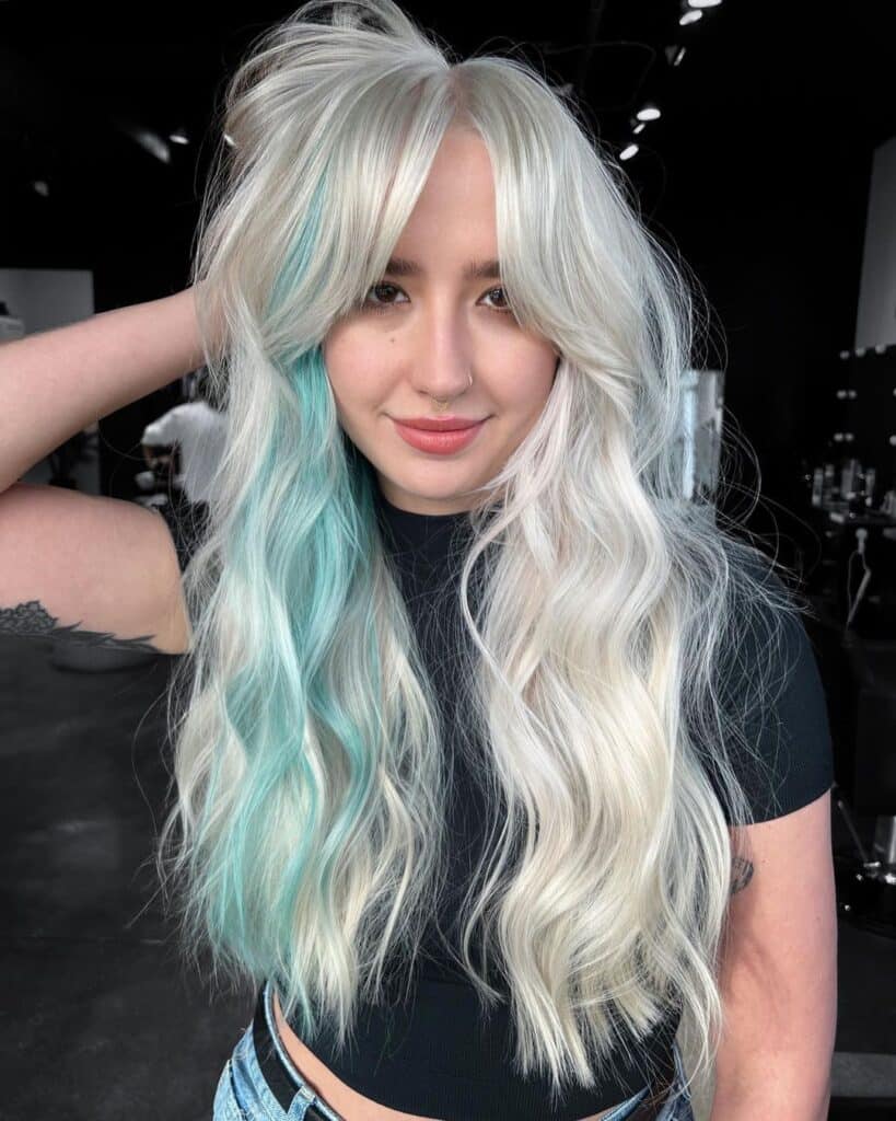 icy platinum blonde curtain bangs 