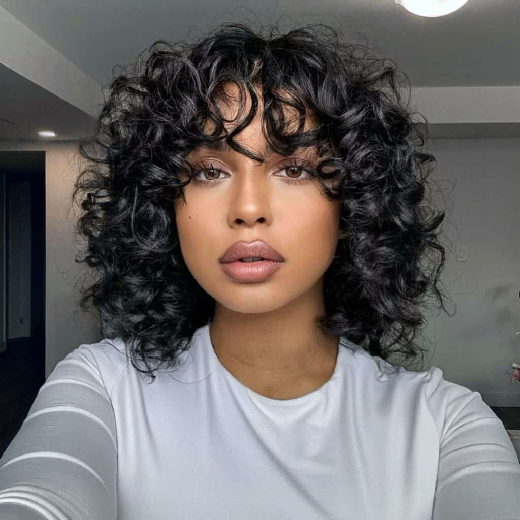 short naturally curly black bob