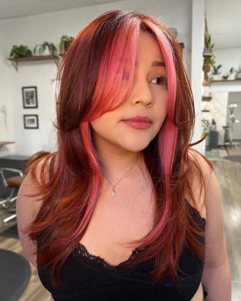 Curtain bangs on pink money piece copper red hair 