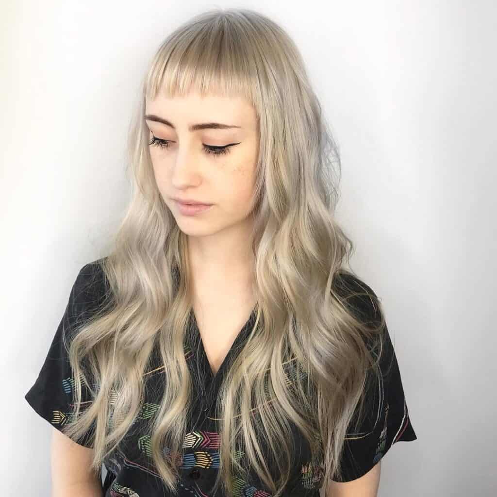 long blonde hair with short bangs