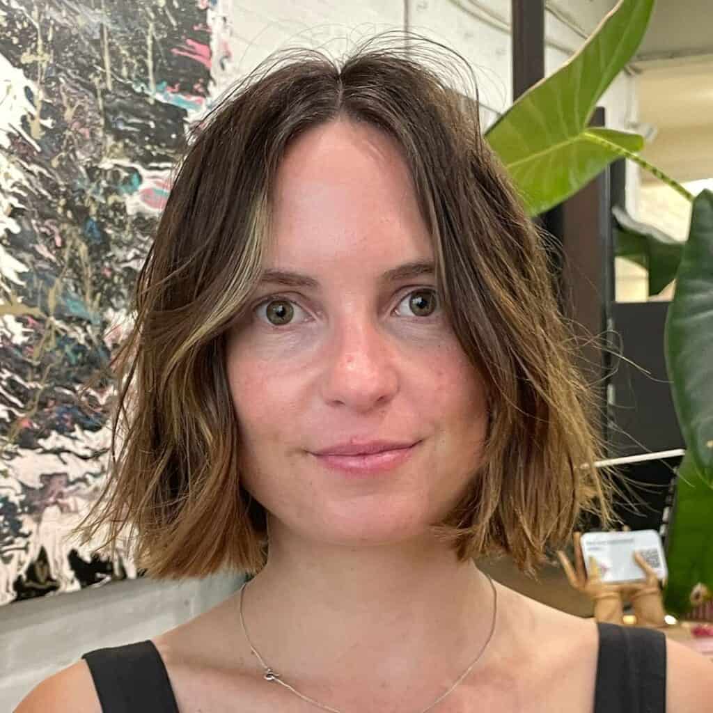 disheveled bob haircut with bangs 