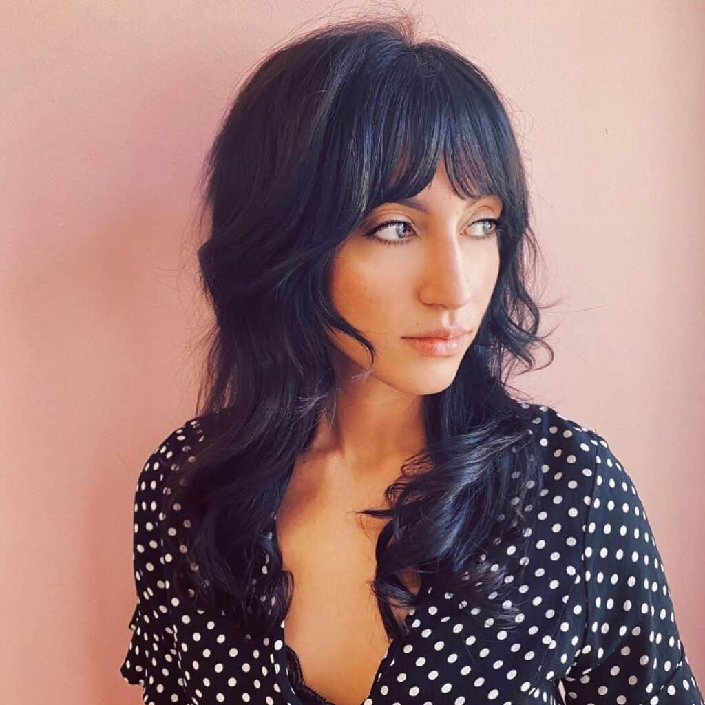 wavy face framing layers with bangs 