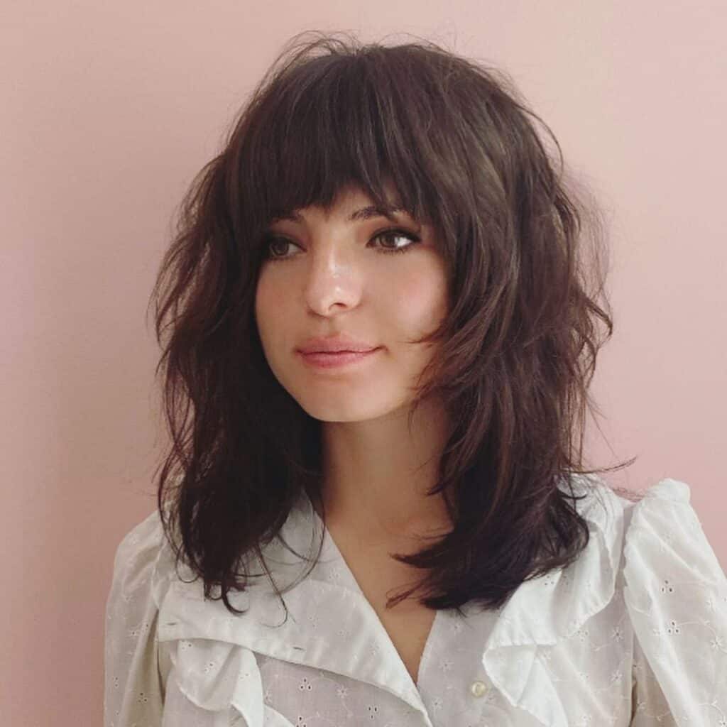 face framing layers on a lob with bangs 
