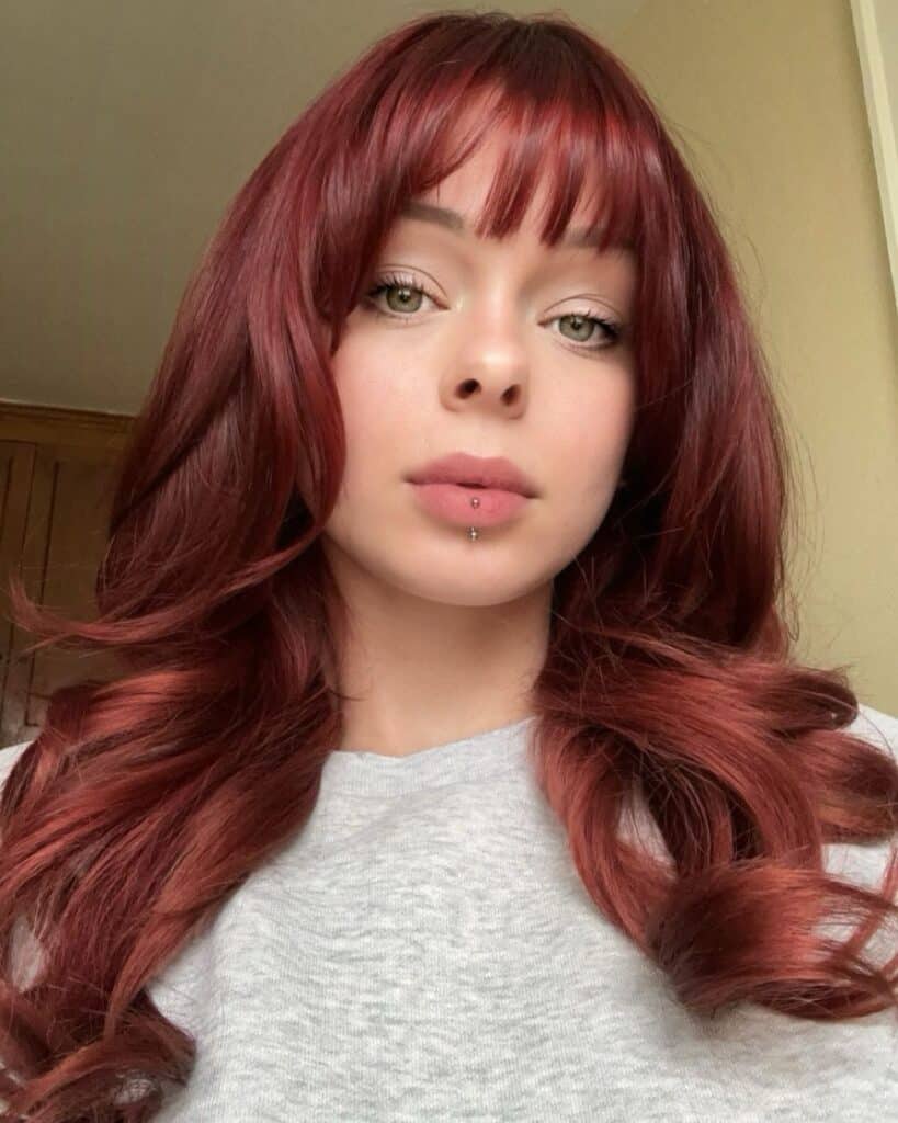 dark cherry cola hair with bangs