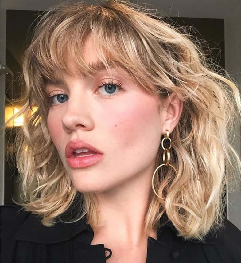 Textured blonde shag cut on thin hair