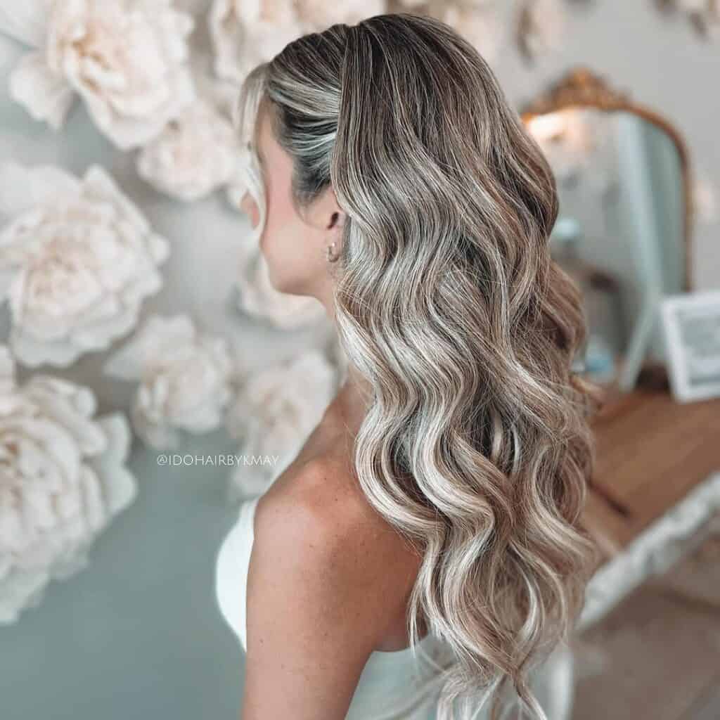 half up wavy hairstyle on long thin hair